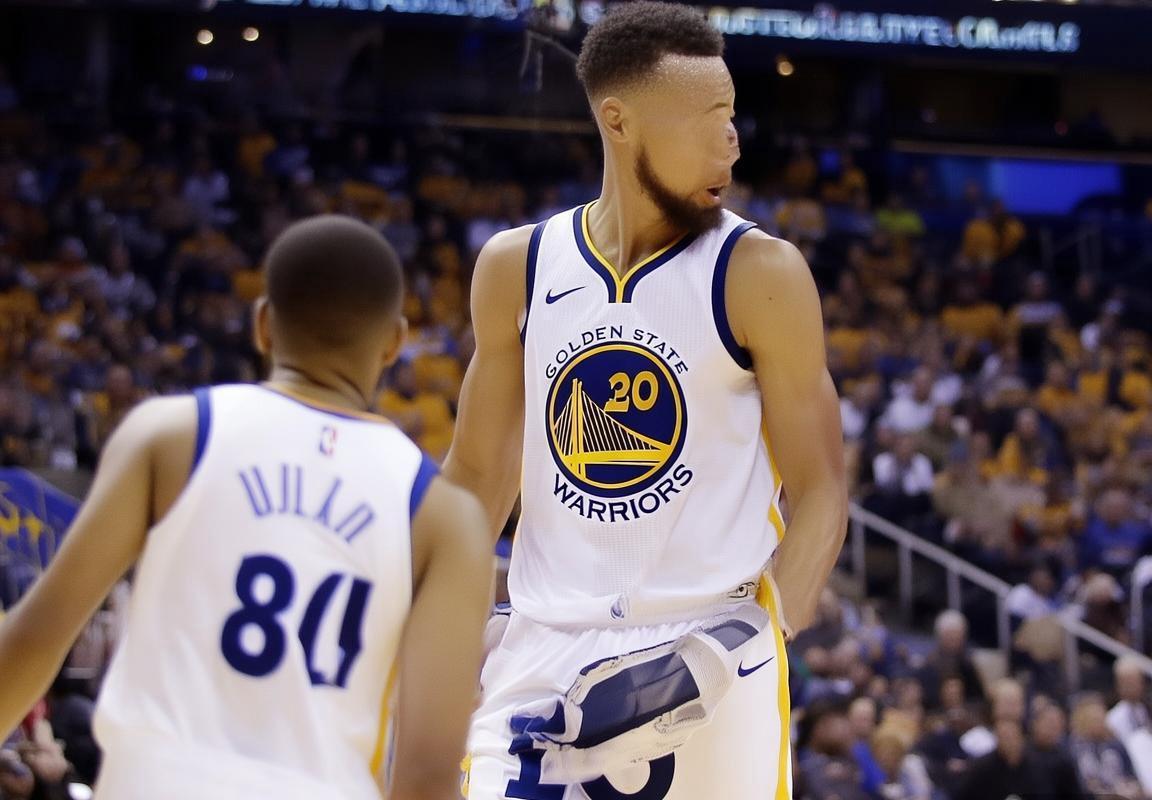 金州勇士客胜奥兰多魔术：斯蒂芬·库里率队以防守反击制胜，三分球命中率低迷仍显韧性