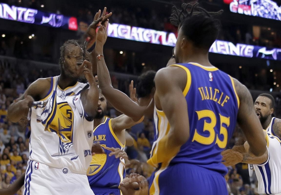 金州勇士客胜奥兰多魔术：斯蒂芬·库里率队以防守反击制胜，三分球命中率低迷仍显韧性